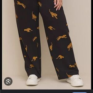 Torrid Black and Gold Wide Leg Pants with Animal Motifs